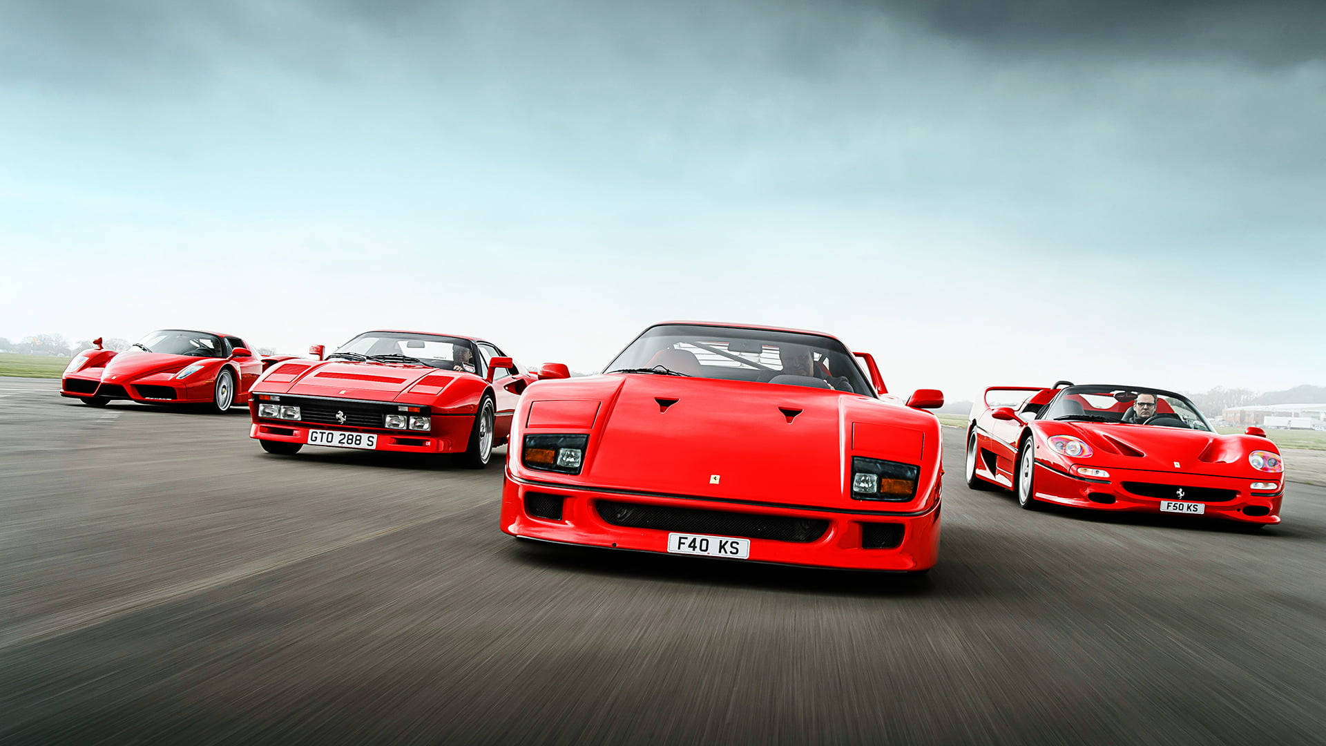 Racing Four Red Ferrari Ipad Wallpaper