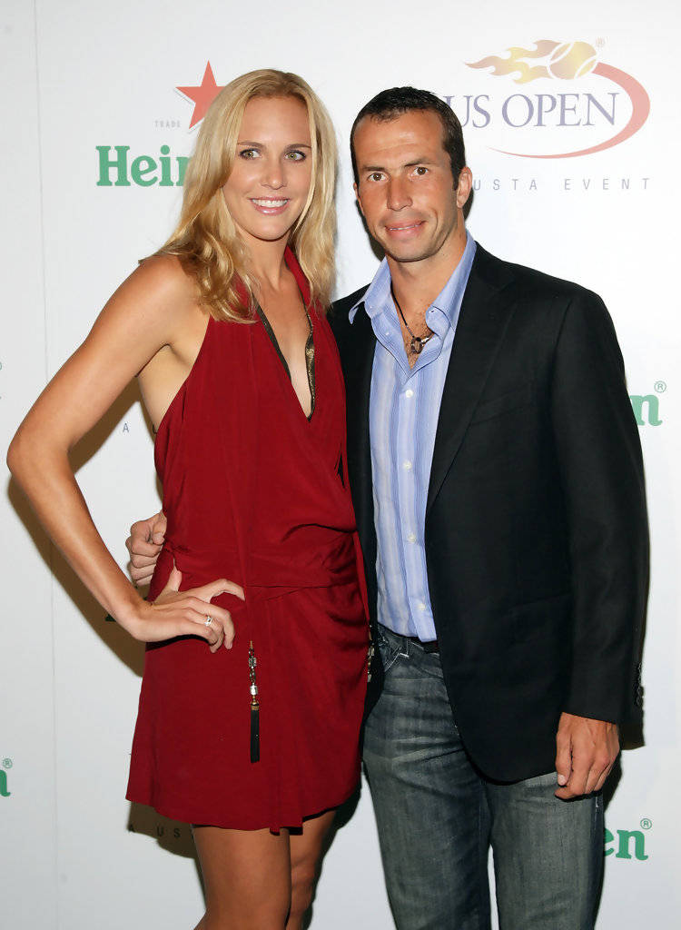 Radek Stepanek Standing Next To Wife Wallpaper