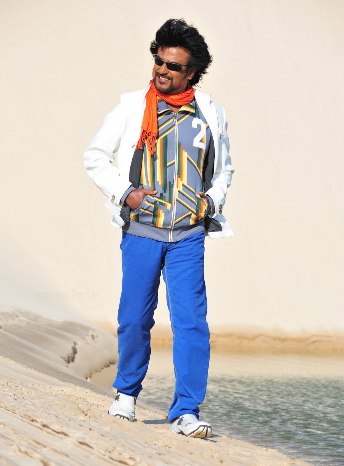 Rajinikanth, Indian Superstar, Boldly Trekking Across Desert Dunes. Wallpaper