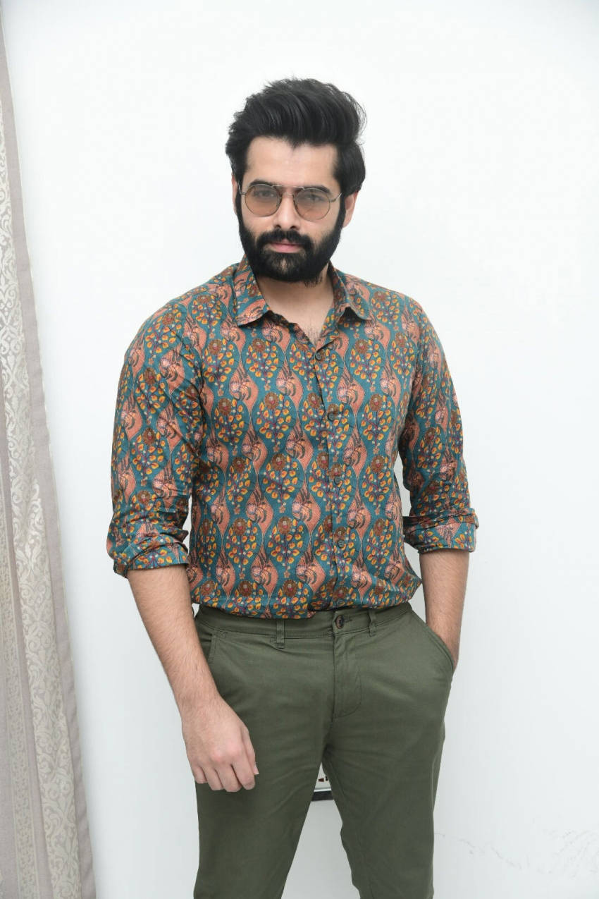 Ram Pothineni Posing White Wall Wallpaper