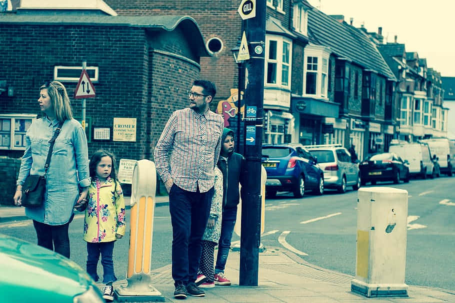 Random People At A Street Intersection Wallpaper