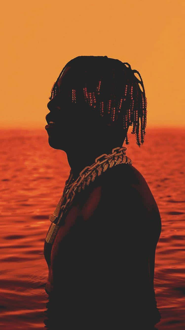 Rap Artist Lil Yachty Behind The Turntables Wallpaper