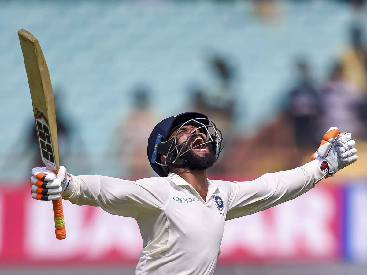 Ravindra Jadeja With Stretched Arms Wallpaper