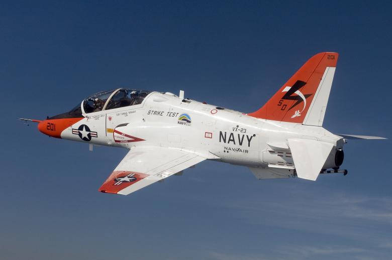 Red And Gray U S Navy T-45c Flying Wallpaper