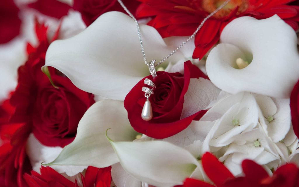 Red And White Flowers With Jewelry Wallpaper