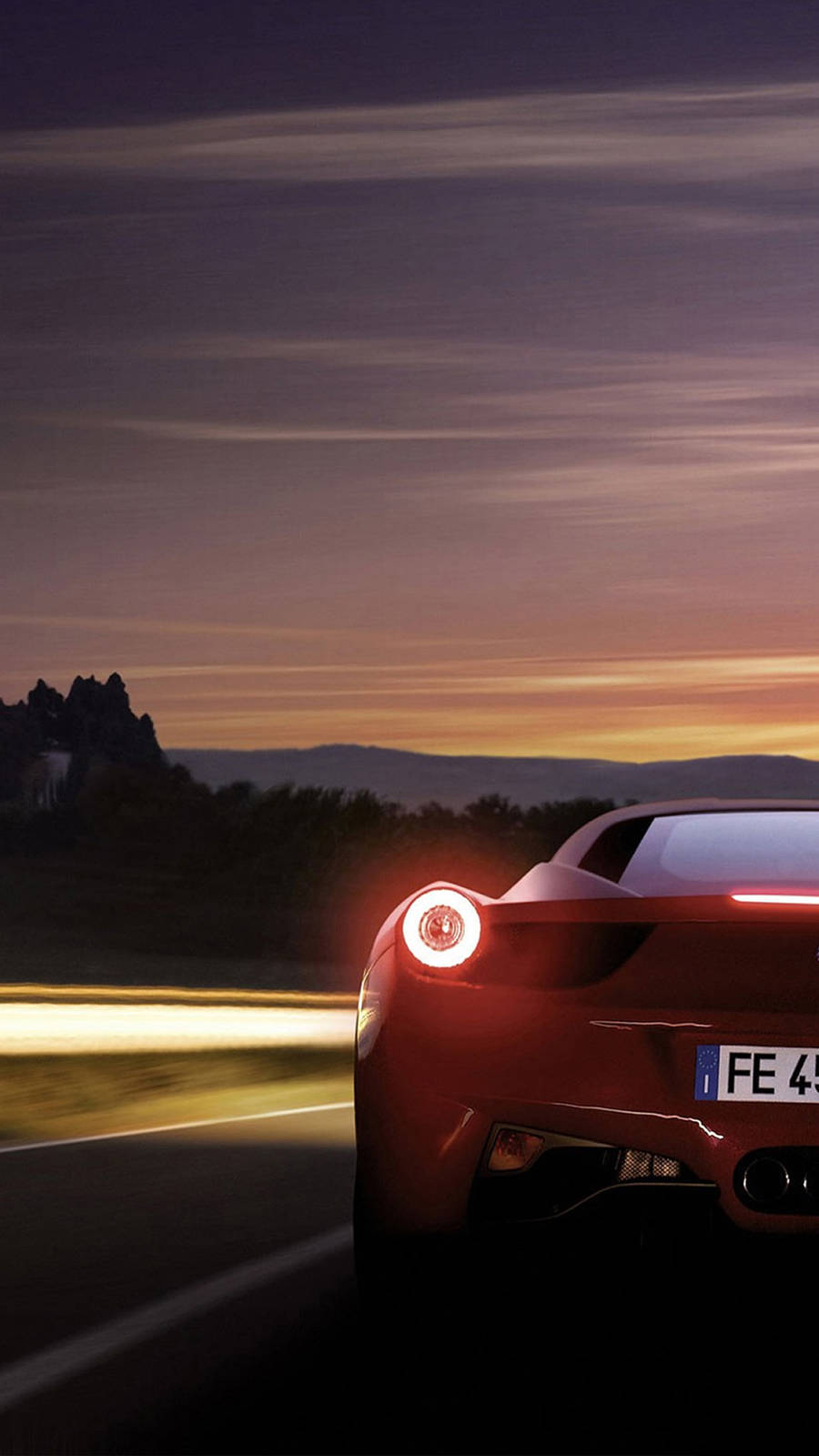 Red Ferrari Phone Against Purple Sky Wallpaper