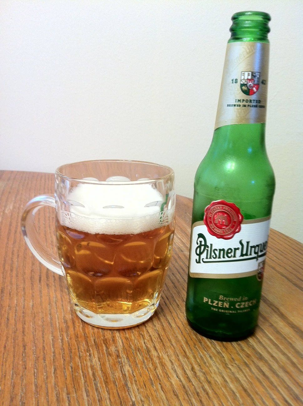 Refreshing Pilsner Urquell In Glass Wallpaper