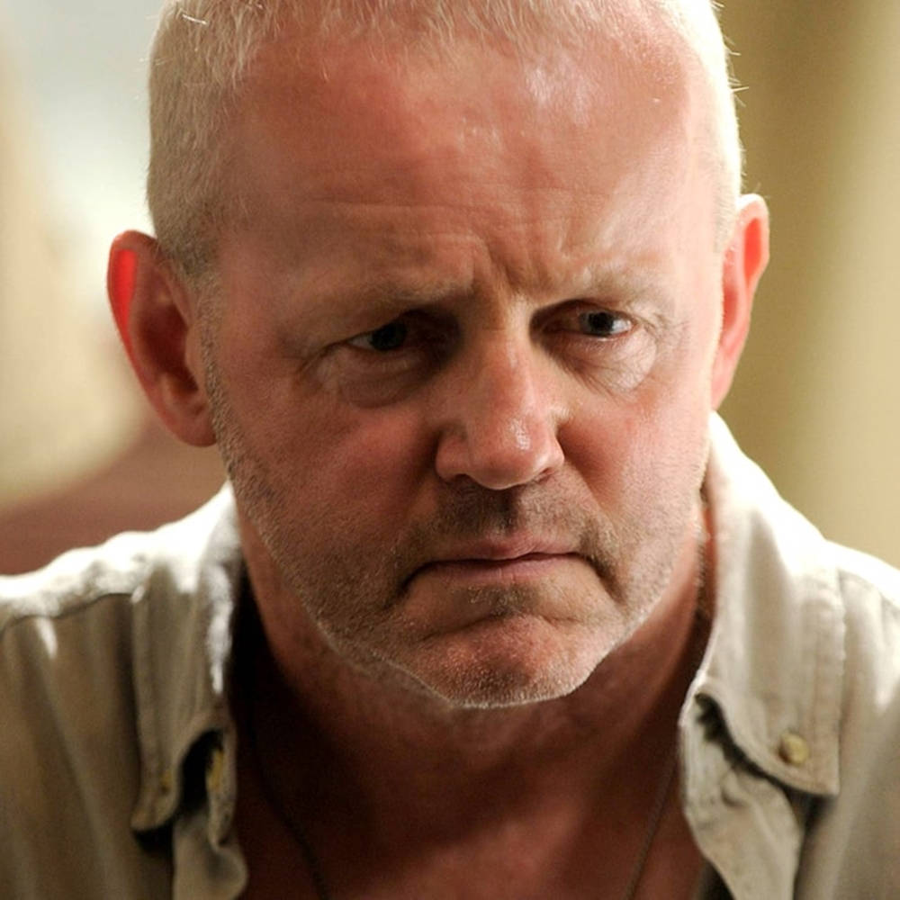 Renowned Actor David Morse Exhibiting A Serious Expression Wallpaper