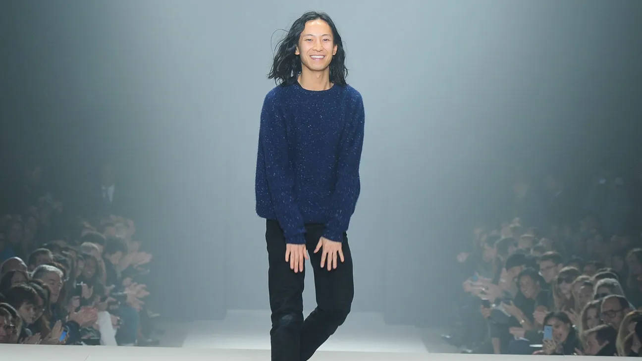 Renowned Fashion Designer Alexander Wang Sporting A Stylish Blue Sweater Wallpaper