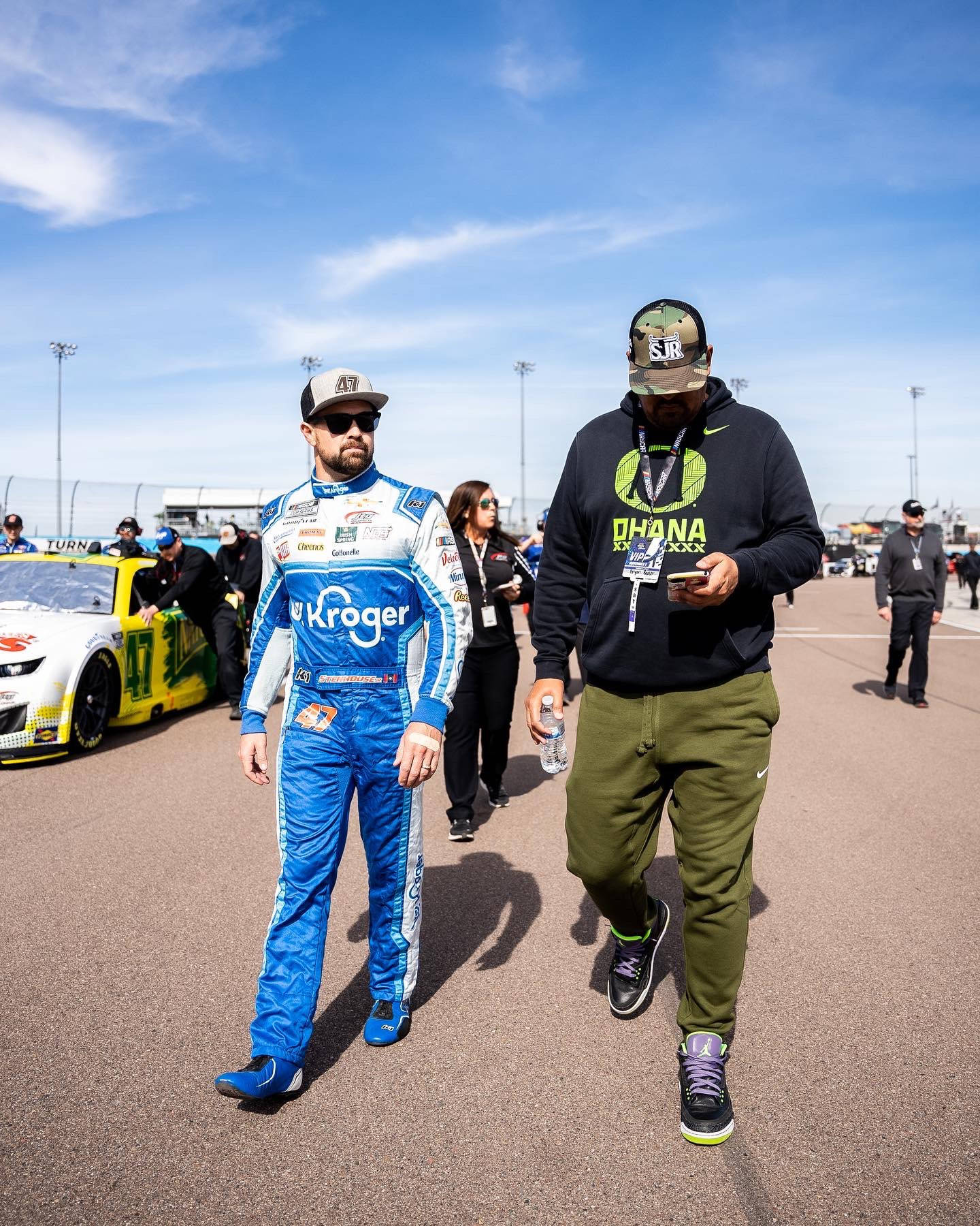 Ricky Stenhouse Jr Confidently Striding Down The Raceway Wallpaper