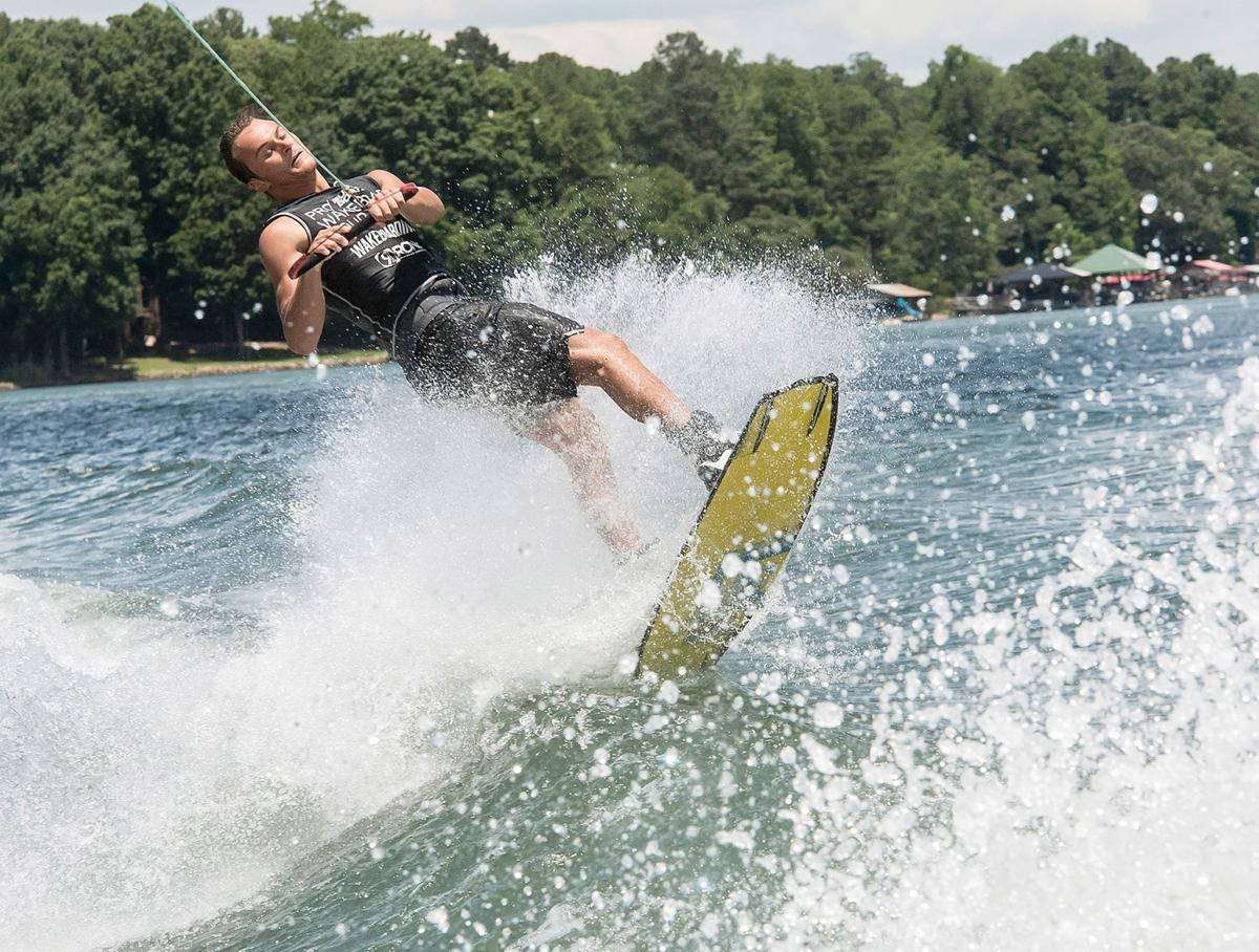 Rider Wakeboarding Mid-air Trick Wallpaper