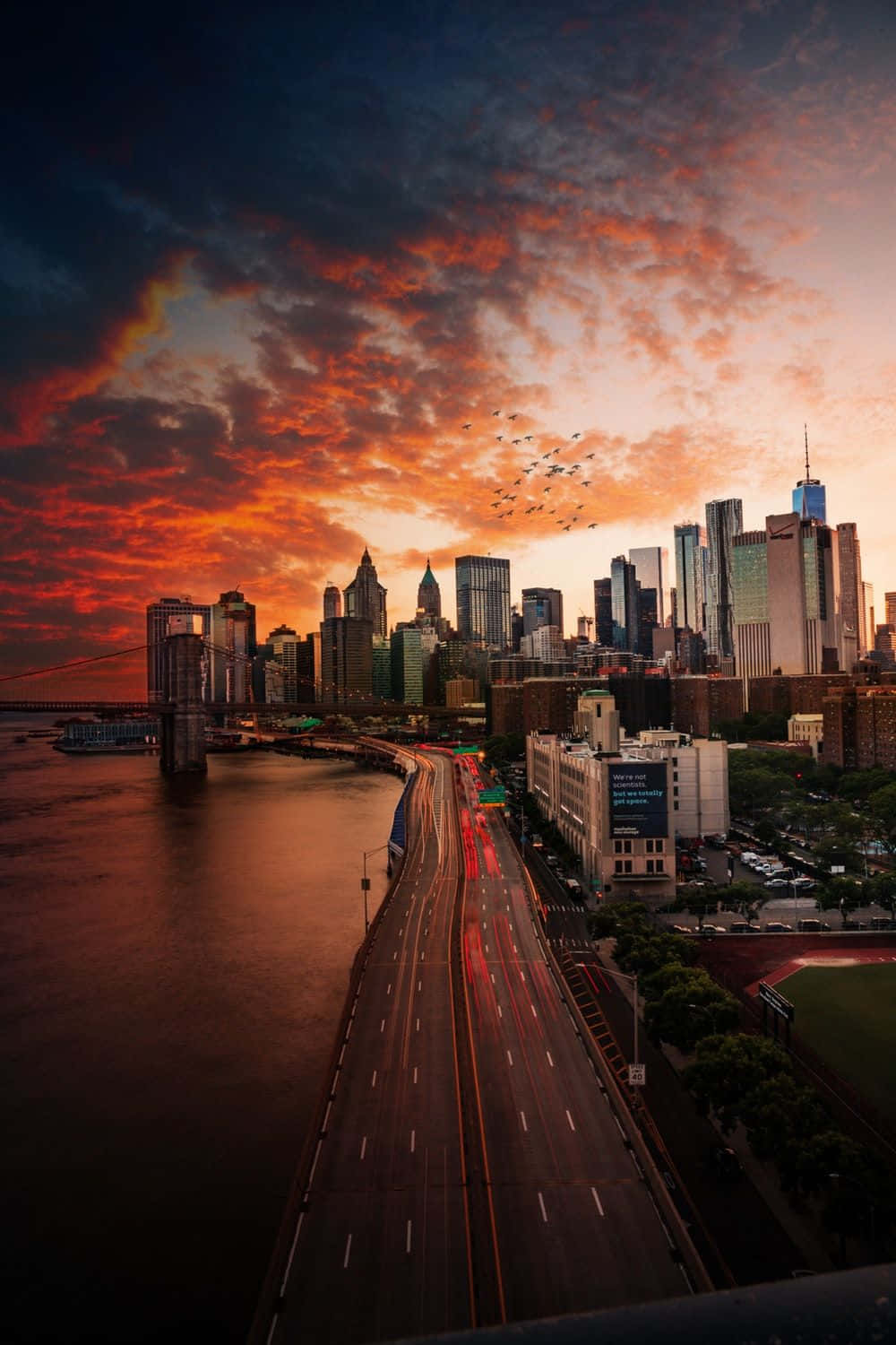 Road To City Under Evening Sky Wallpaper