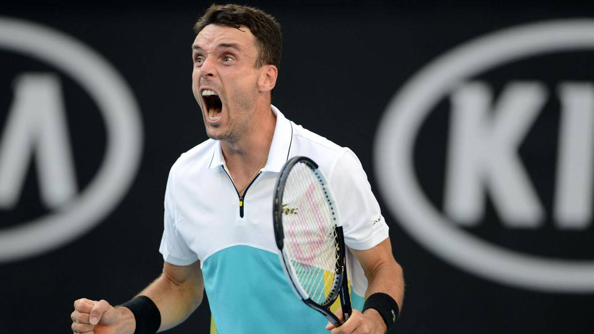 Roberto Bautista Agut In Action On The Tennis Court Wallpaper