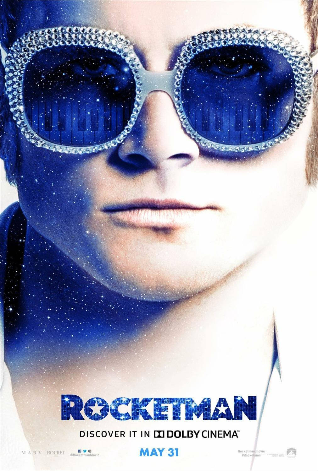 Rocketman With Blue Fashionable Eyeglasses Wallpaper