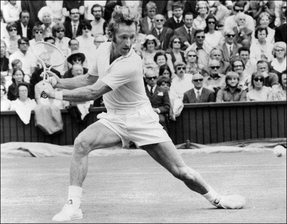 Rod Laver In Full Swing At 1962 Wimbledon Tournament Wallpaper