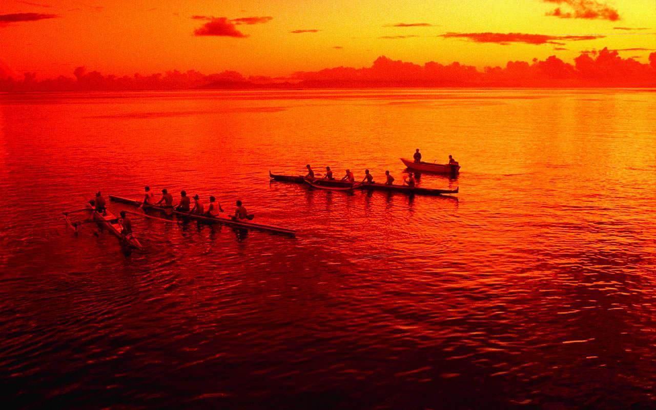Rowing Crew In Sunset Wallpaper