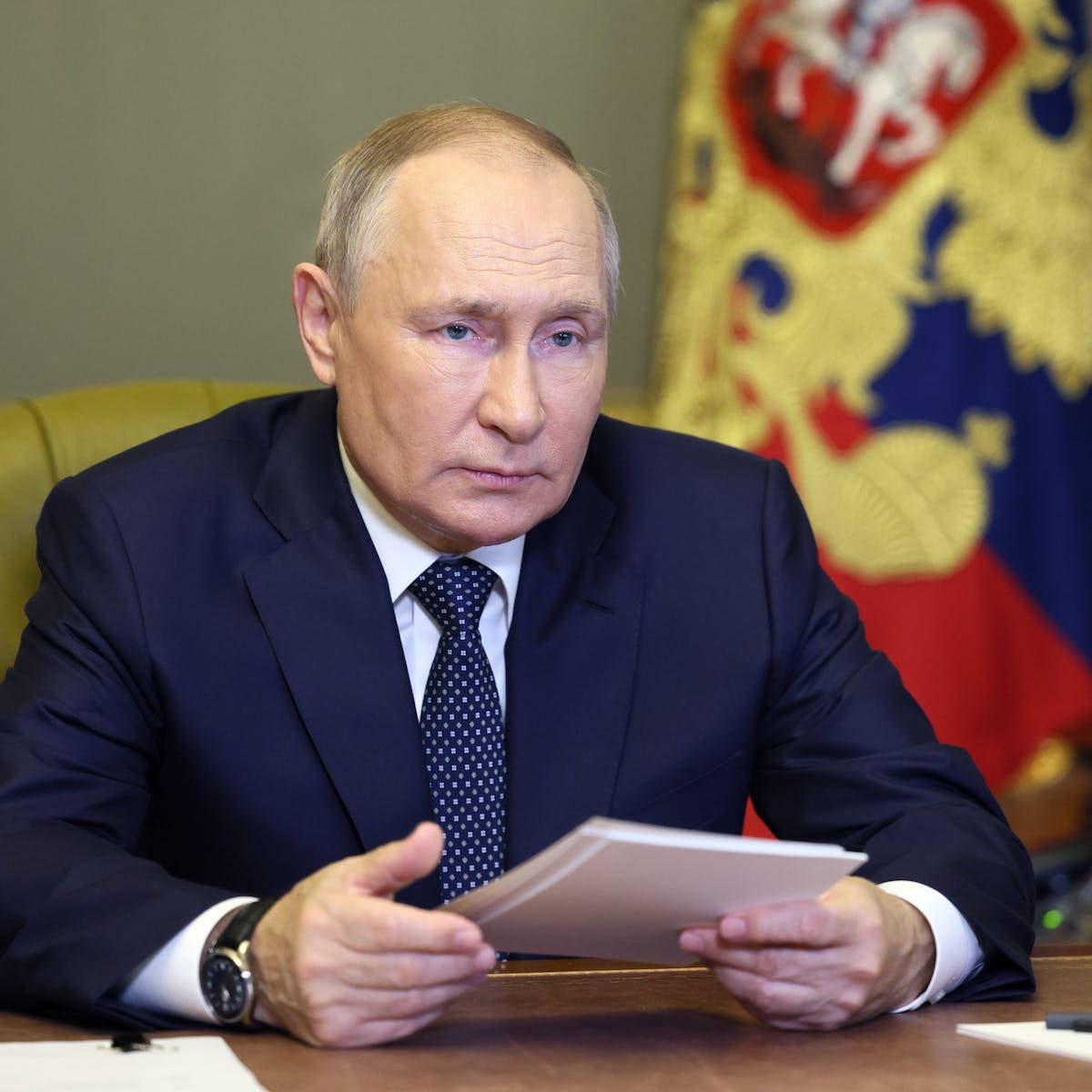 Russian President Vladimir Putin Holding Important Documents Wallpaper