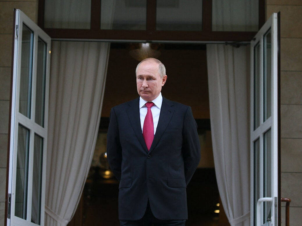 Russian President, Vladimir Putin Standing In Front Of Open Doors Wallpaper