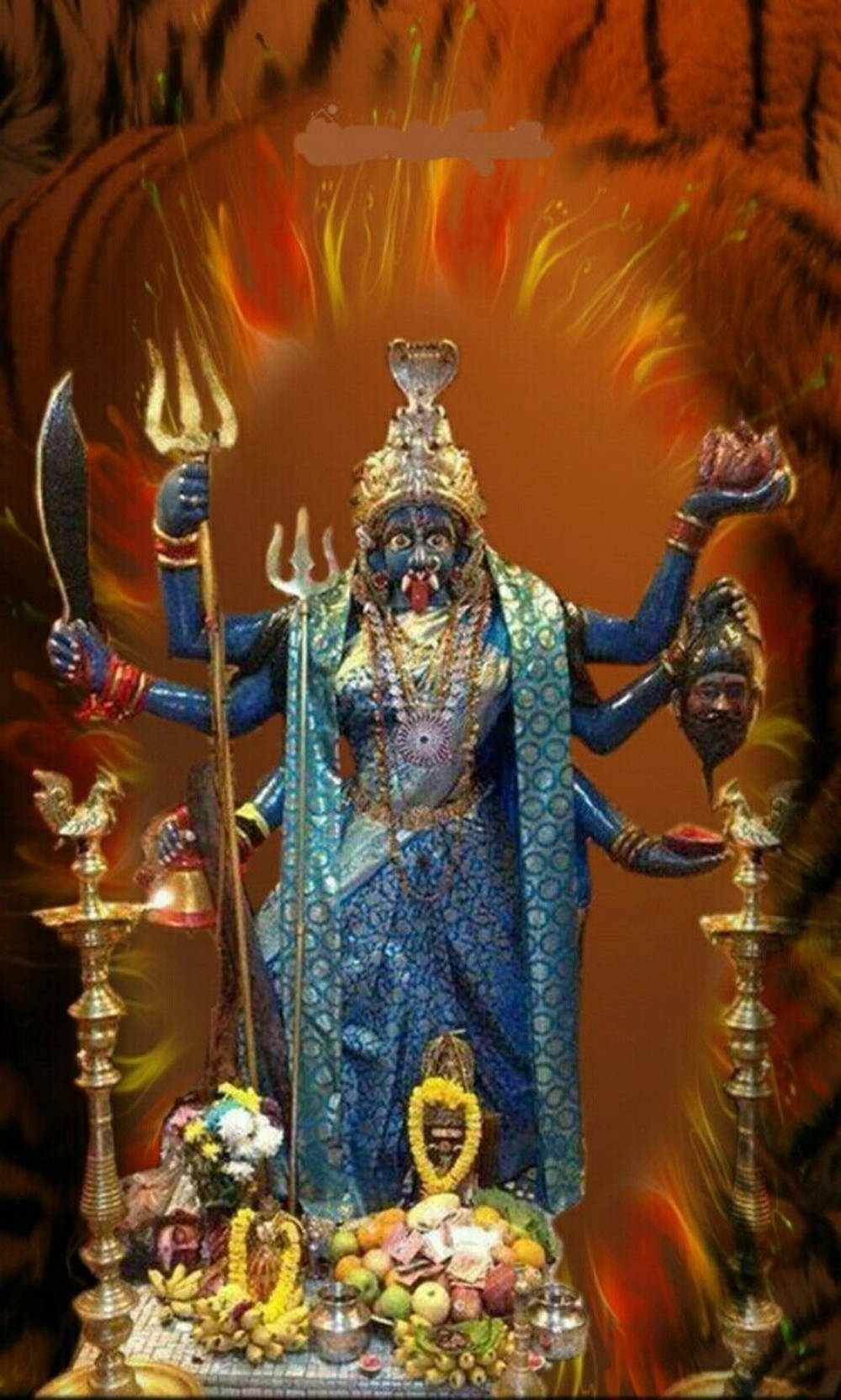 Sacred Statue Of Maa Kali In Vivid Blues Wallpaper