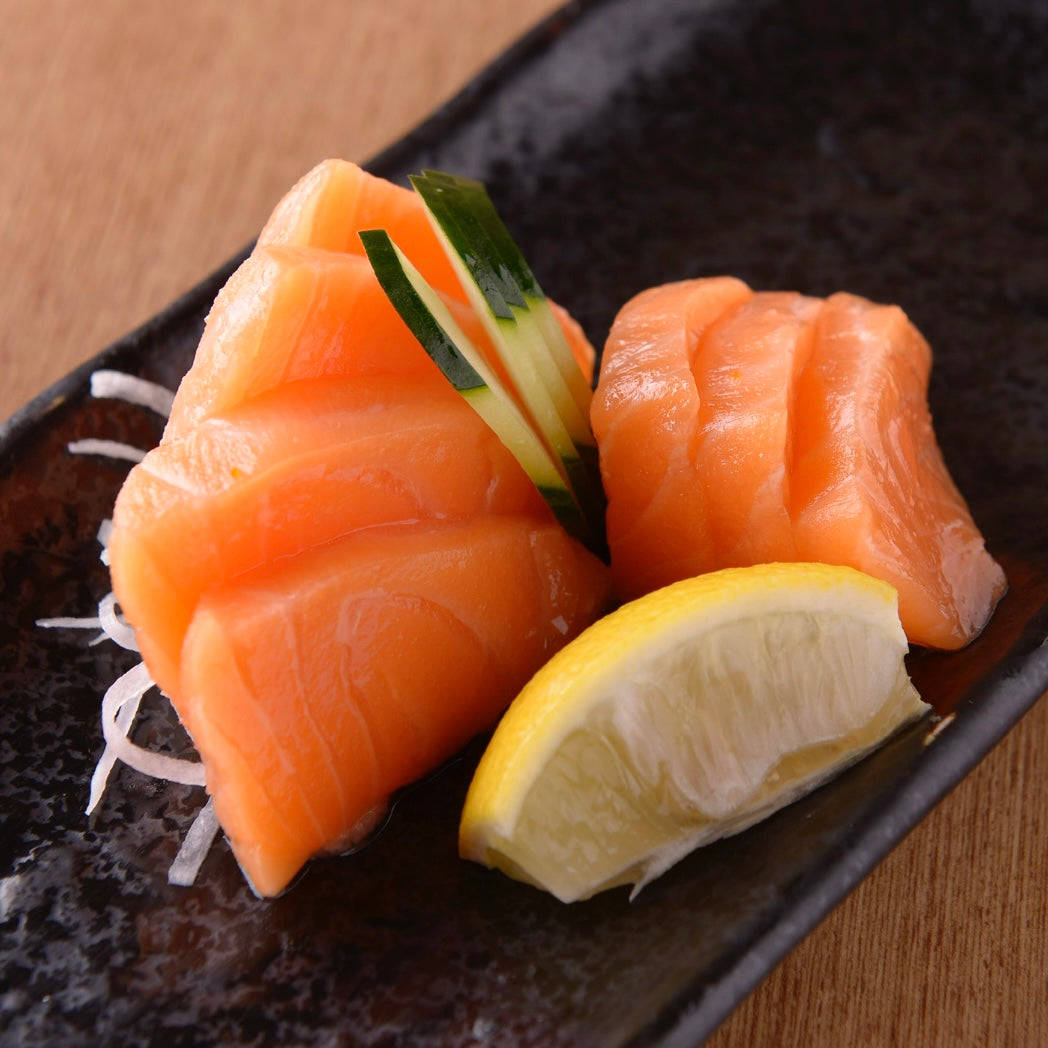 Salmon Sashimi With Cucumber And Lemon Wallpaper