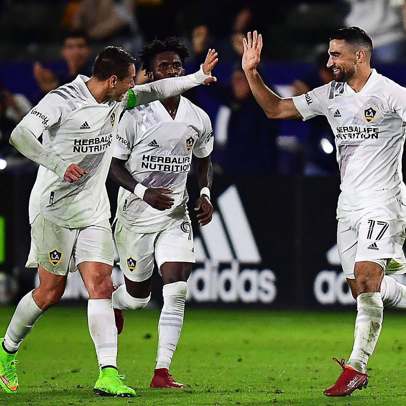 Sebastian Lletget High Fives Teammate Wallpaper