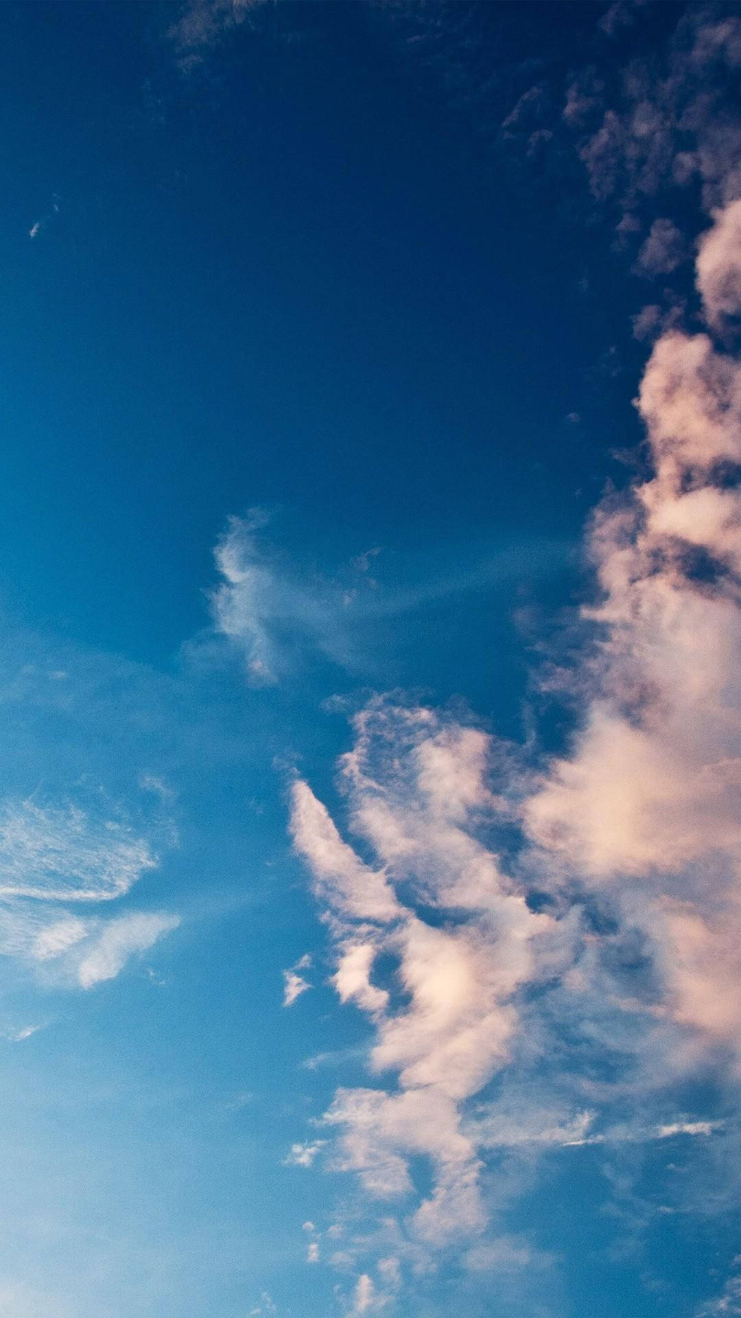 Serene Sky With Light Blue Phone Wallpaper
