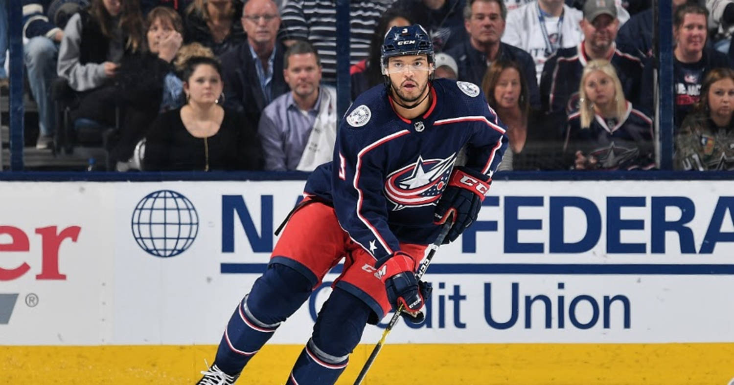 Seth Jones Leaning To The Left Holding Hockey Stick Wallpaper