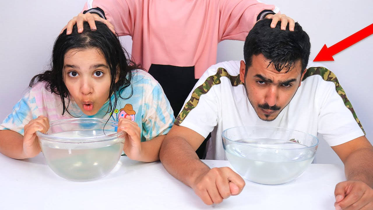 Shfa And Dad With Bowls Wallpaper