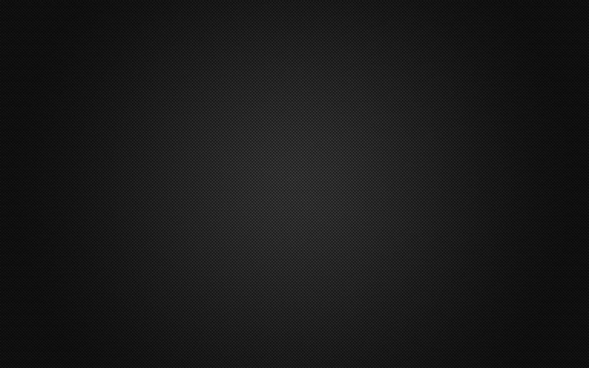Shine In The Darkness With Black Carbon Fiber Wallpaper