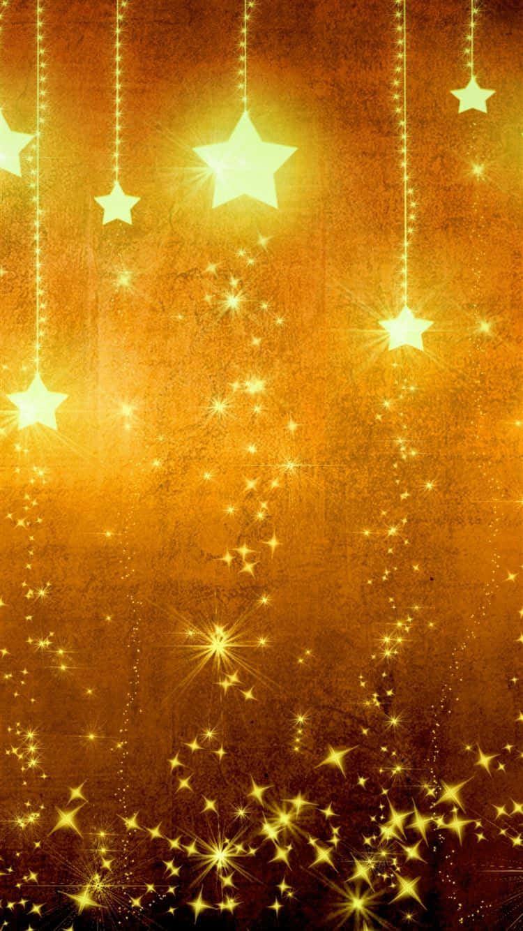 Shining Brightly Against A Black Background, These Stunning Gold Stars Will Add A Touch Of Elegance To Your Decor. Wallpaper