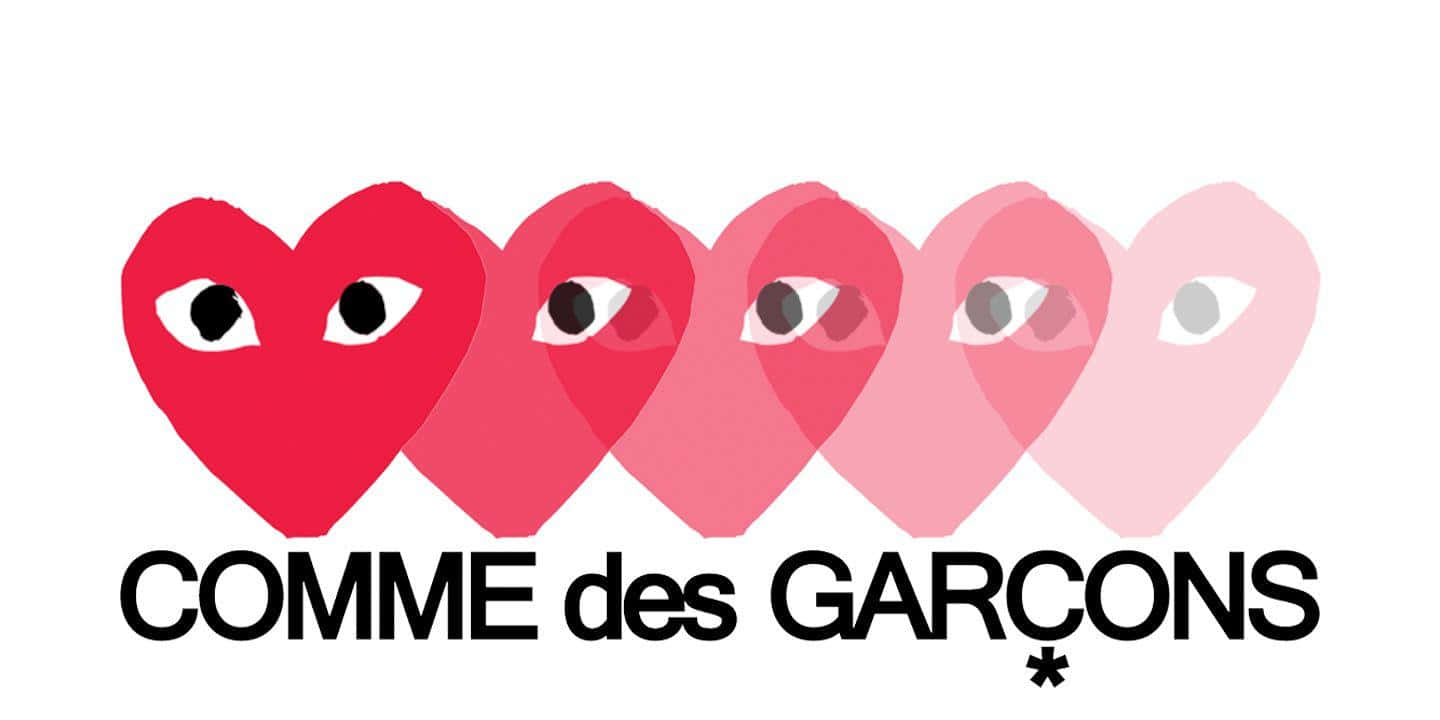 Show Your Playful Side With The Stylish Cdg Play Collection Wallpaper