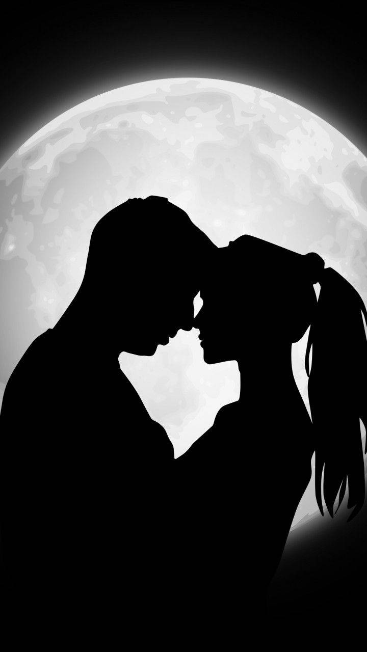 Silhouette Of Cute Couple In Moonlight Wallpaper