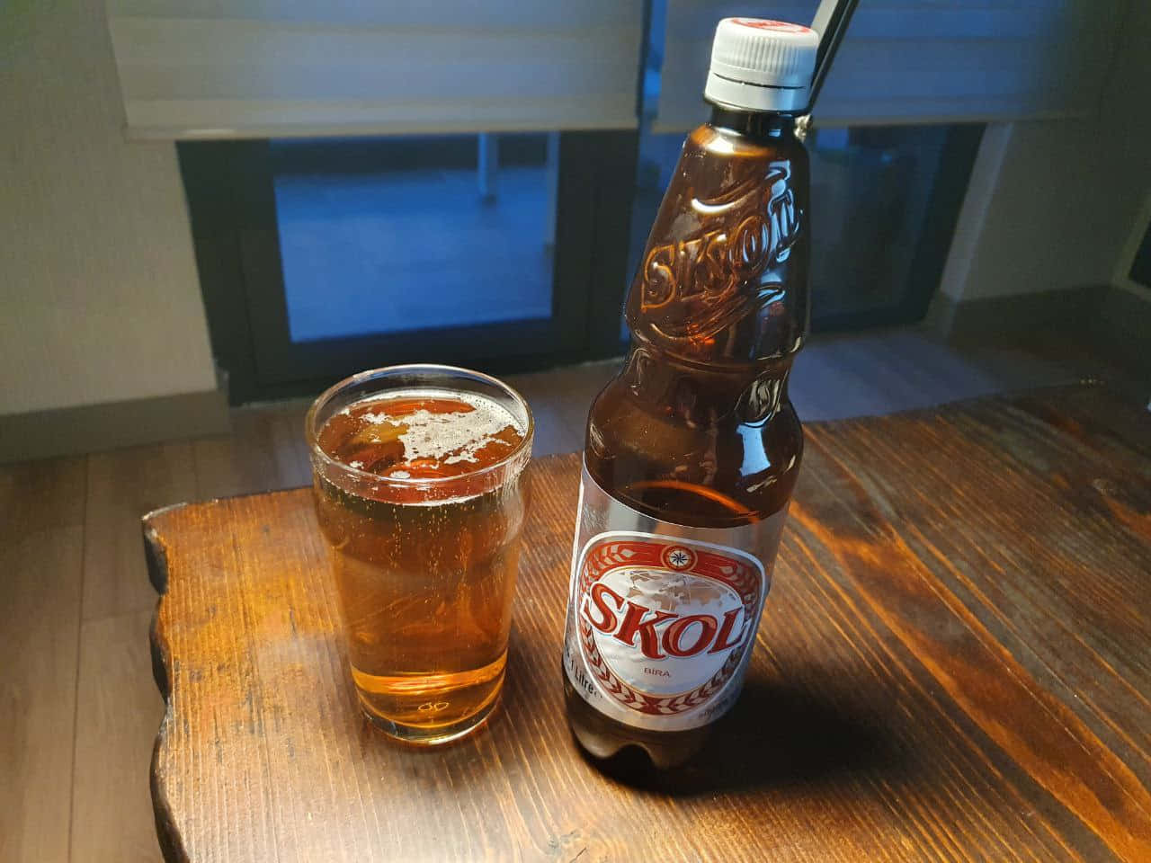 Skol Beer Bottleand Glass Wallpaper