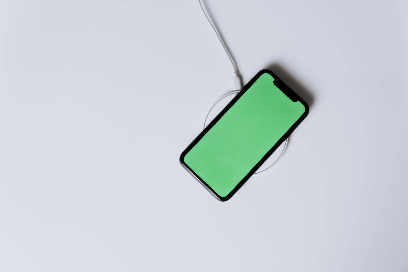 Smartphone On Green Screen Background Wallpaper