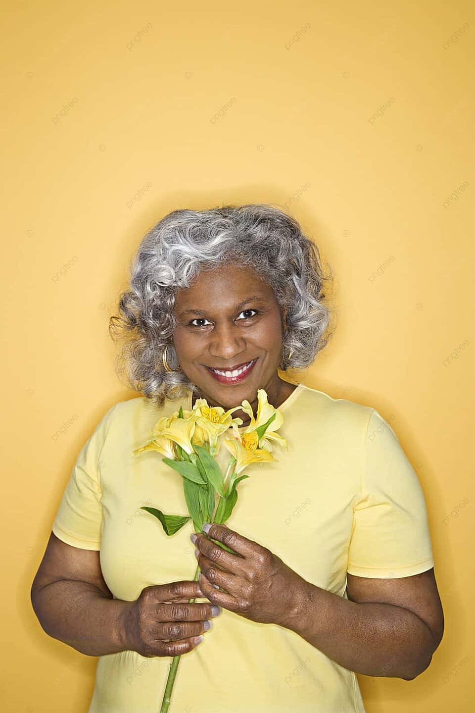 Smiling Middle Aged Woman Yellow Backdrop Wallpaper