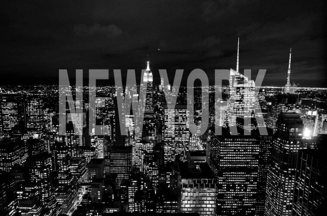Soak In Stunning City Views At Night In New York Wallpaper