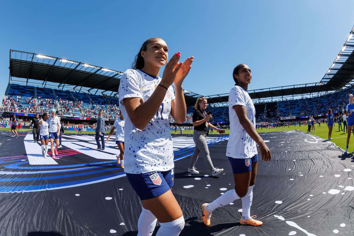 Soccer Players Entering Stadium Wallpaper