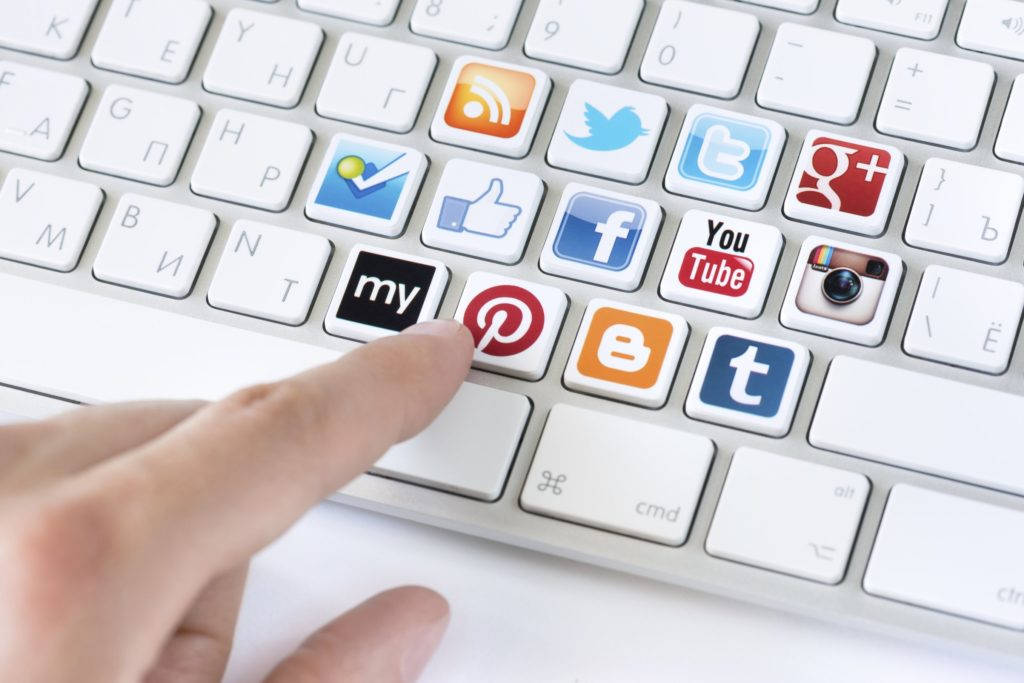 Social Media Icons On A Keyboard Wallpaper