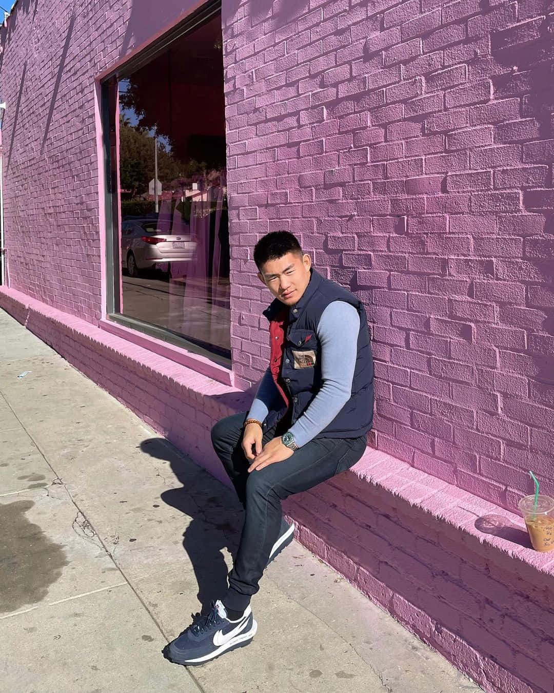 Song Yadong Sitting By Cute Purple Wall Wallpaper