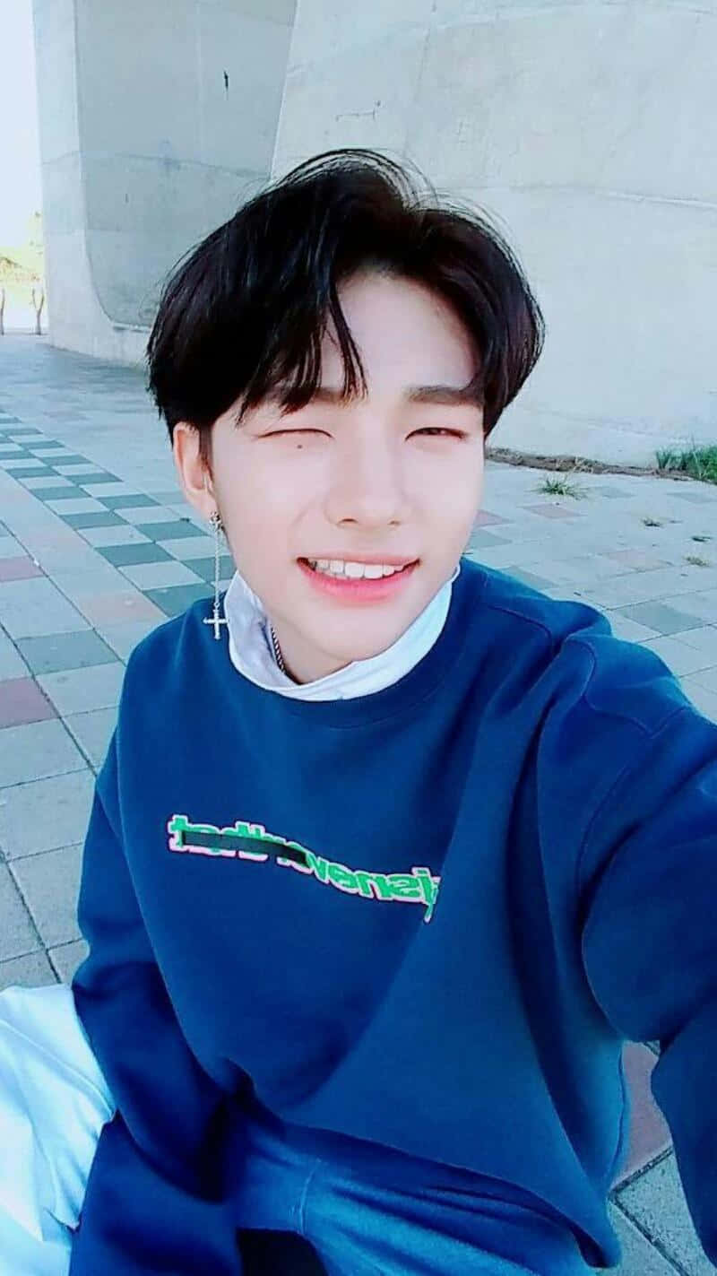 South Korean Rapper Hyunjin Winking Selfie Wallpaper