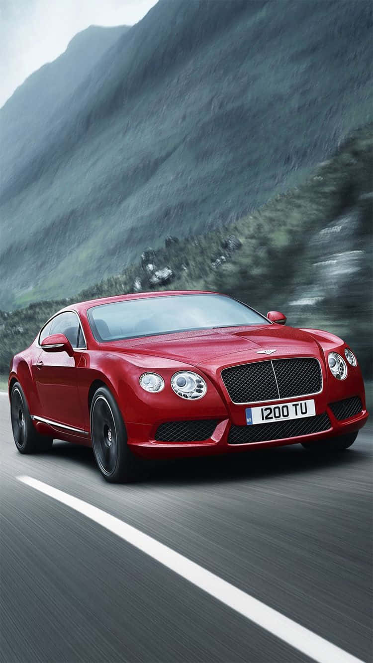 Speeding Red Bentley Iphone Wallpaper