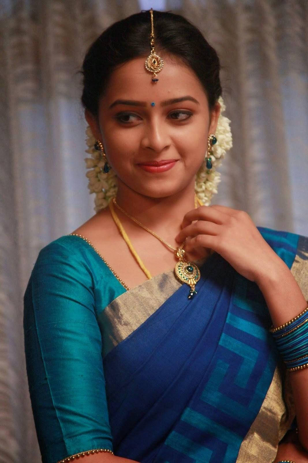 Sri Divya In Blue Dress Wallpaper