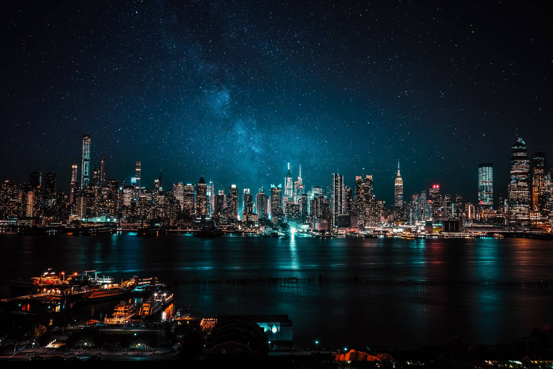 Starry Sky Skyscraper City At Night Wallpaper