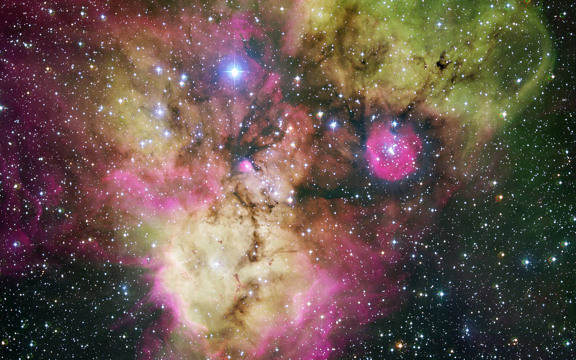 Stars Surrounding A Colorful Galaxy Wallpaper