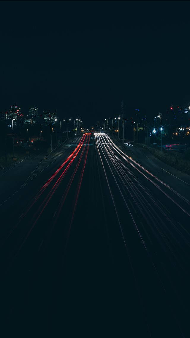 Stellar Night Sky Over Cityscape On Iphone Screen Wallpaper