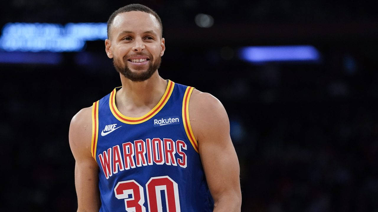 Steph Curry Smiling With Teeth Exposed Wallpaper