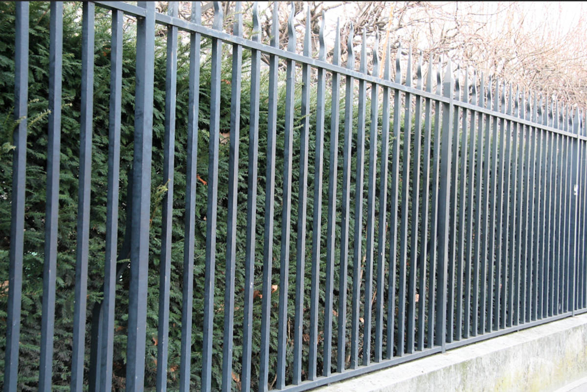 Strong And Durable Gray Iron Metal Fence Wallpaper