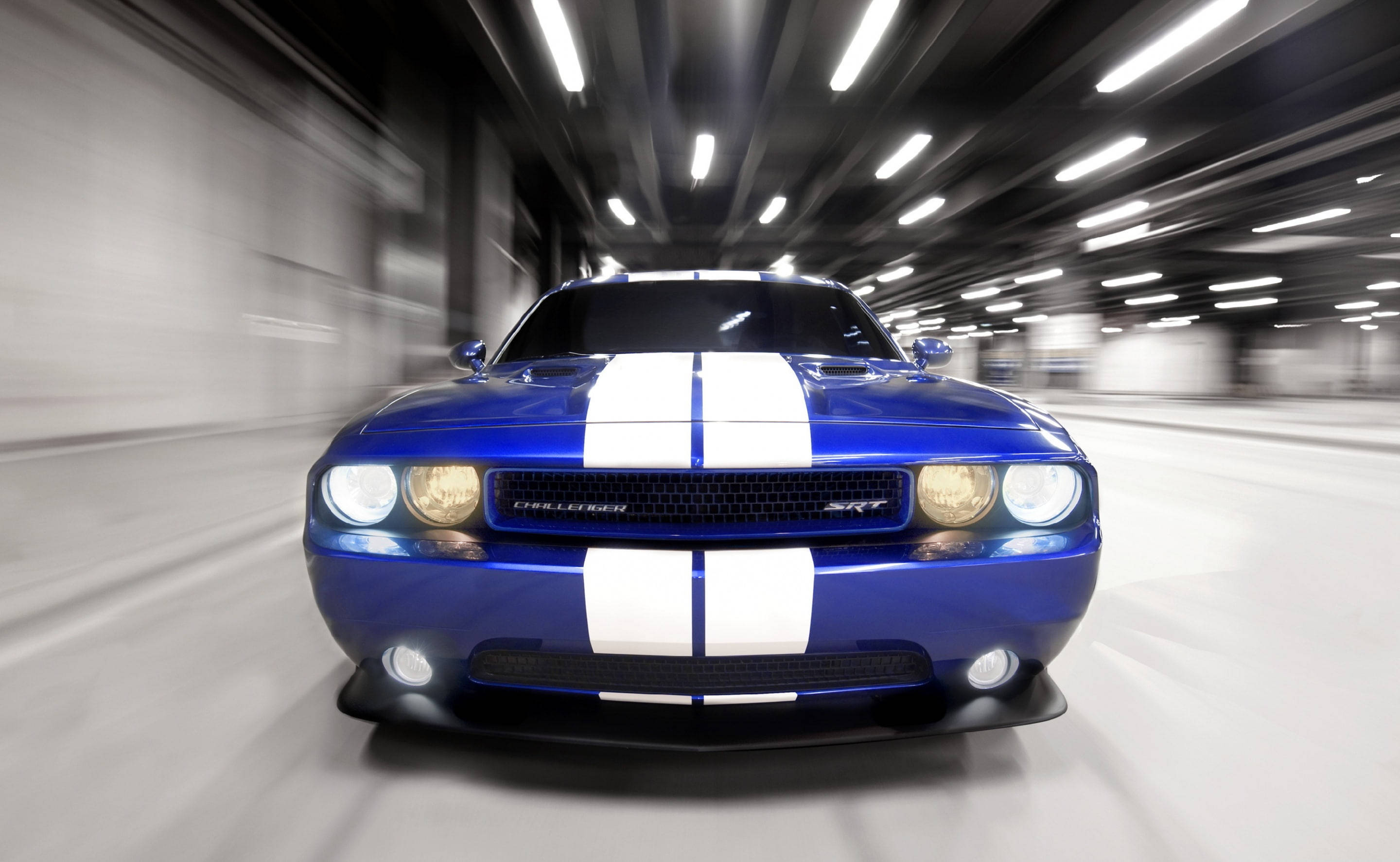 Stunning Blue Dodge Challenger In Motion Wallpaper