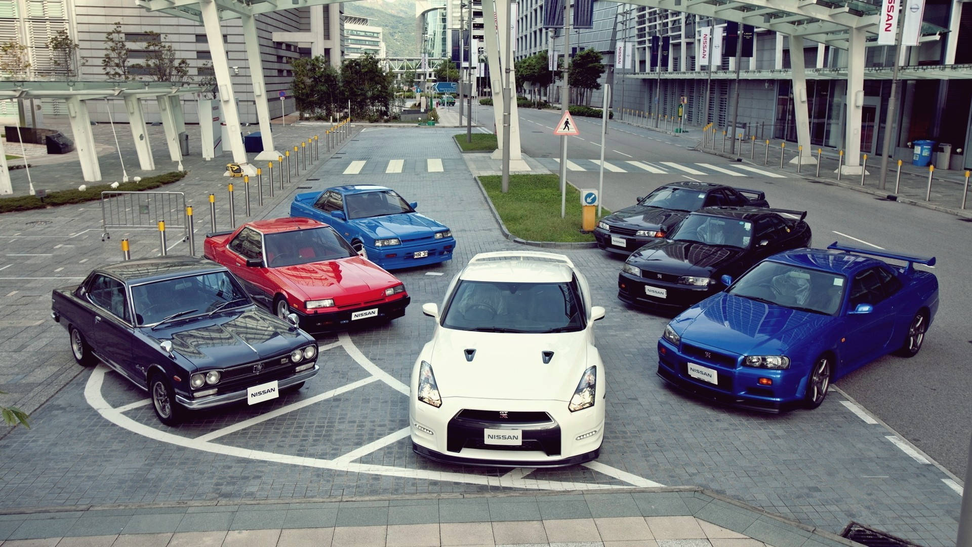 Download free Stunning Fleet Of Skyline Cars Parked Together On A Clear,  Sunny Day. Wallpaper - MrWallpaper.com