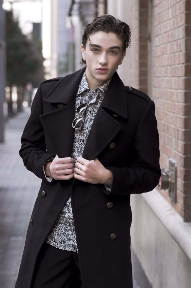 Stylish Young Manin Black Coat Wallpaper